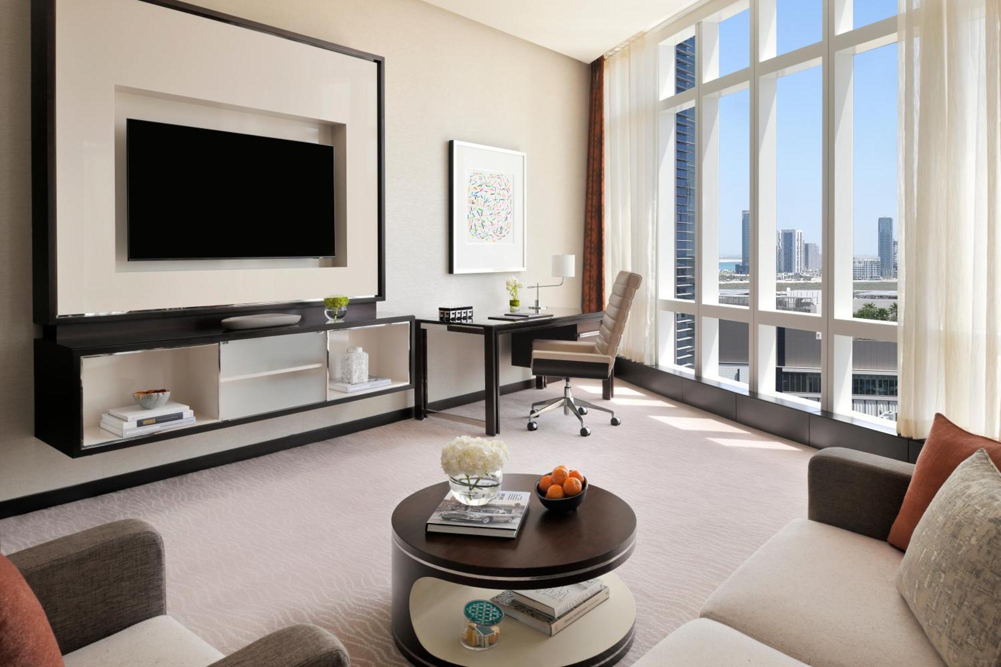 로즈우드 아부다비 호텔 외부 사진 A living room at the Ritz-Carlton, DIFC